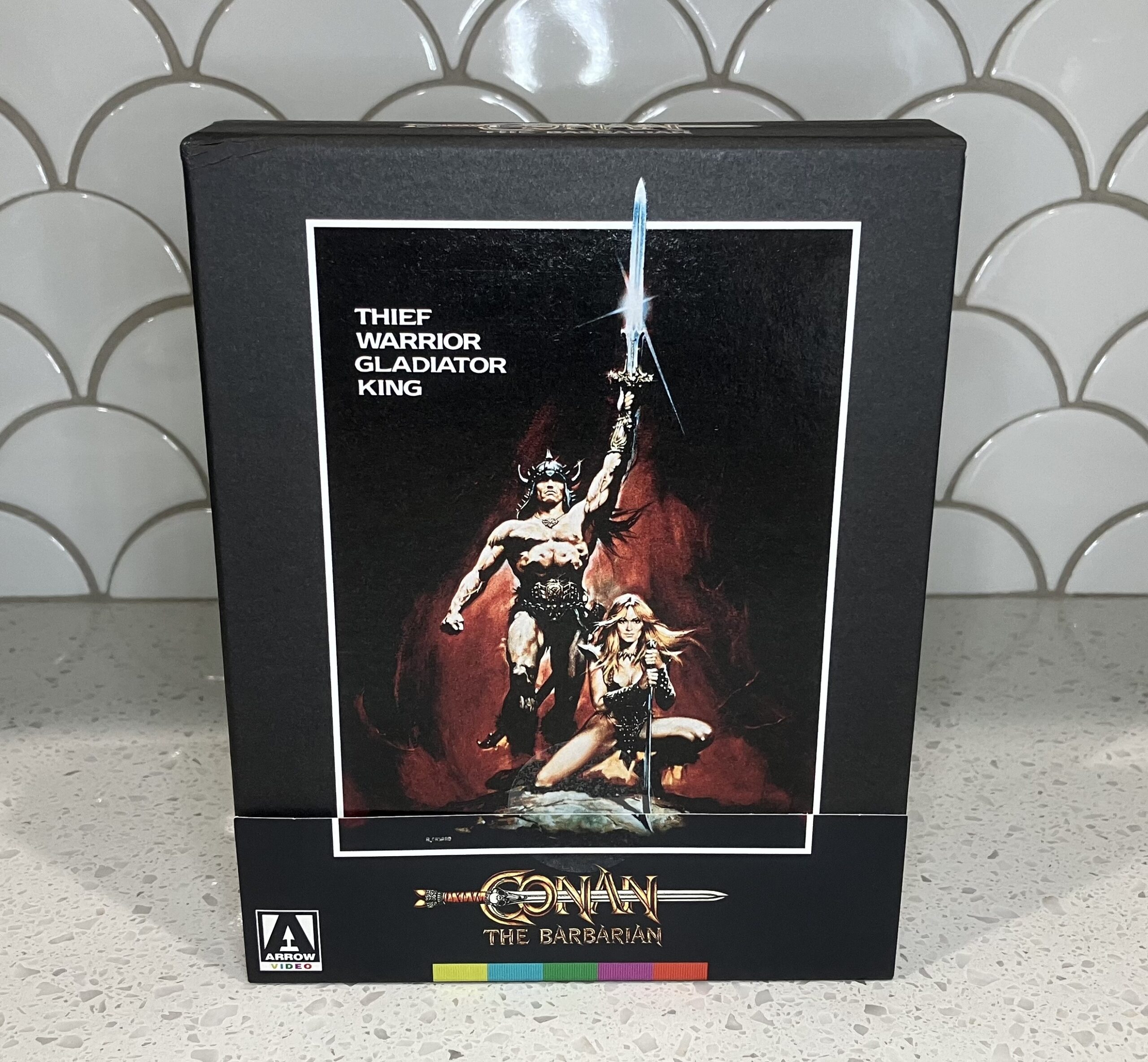 Conan the Barbarian Arrow Films limited edition Blu-ray box set with Conan raising a sword and Valeria kneeling beside him.